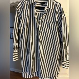 Never worn.  Oversized button up